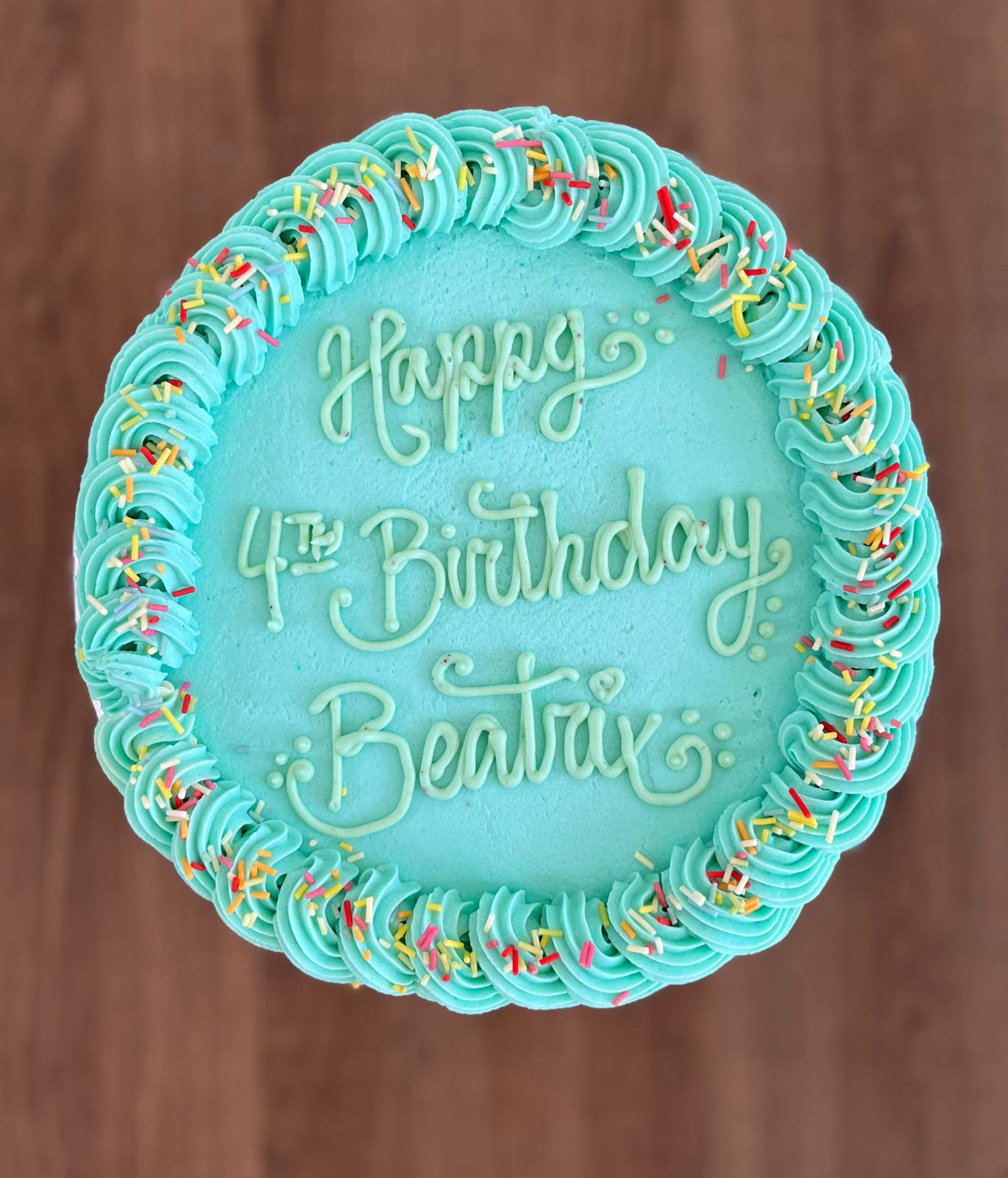 Custom cake reading Happy fourth birthday Beatrix.