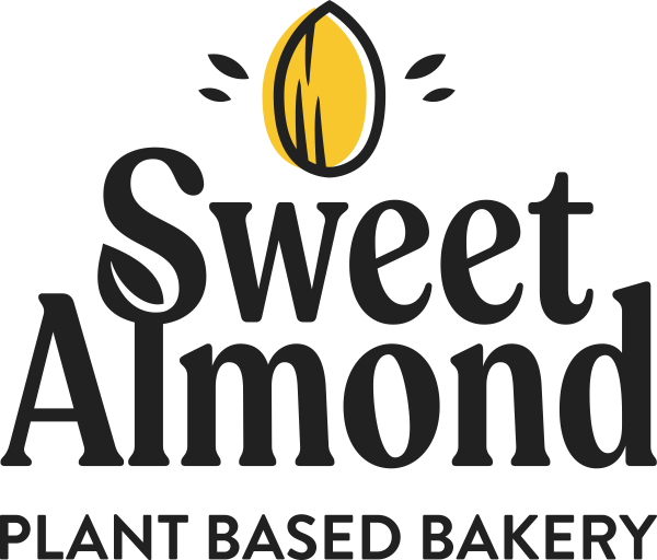 Yellow almond on top of Sweet Almond Plant Based Bakery Title