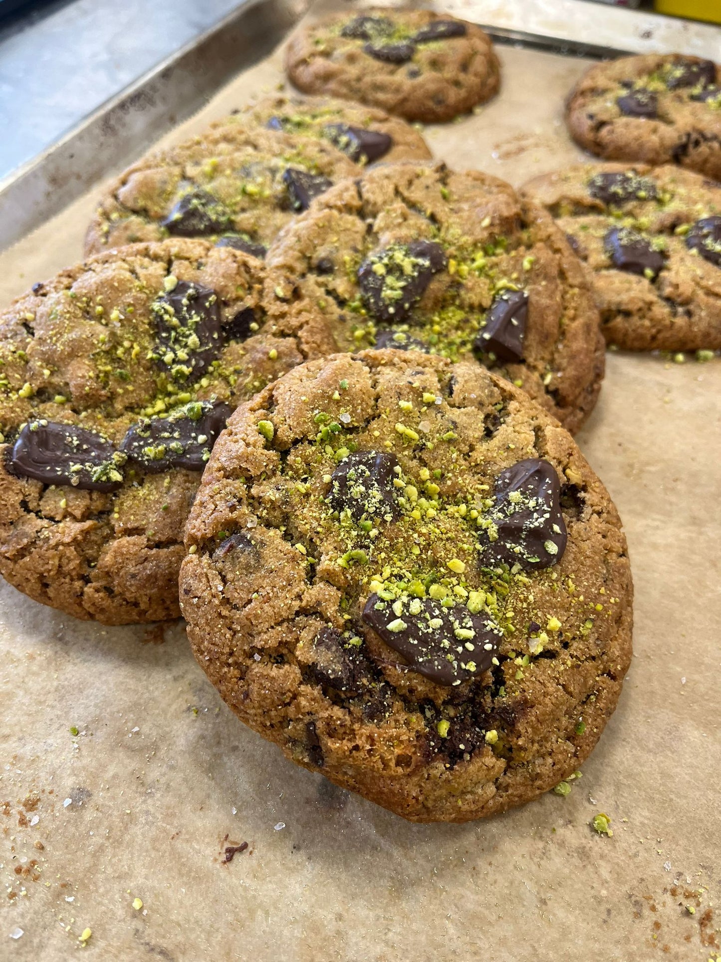 Salted pistachio dark chocolate vegan cookie.